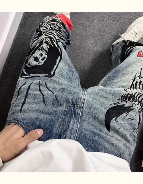 Load image into Gallery viewer, Men's Retro American Street Hip Hop Flame Skull Print Jeans
