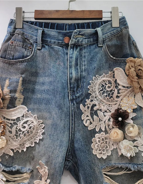 Load image into Gallery viewer, Women's Denim Shorts Elastic Waist Distressed Patchwork Lace Flowers 2026 Summer New Fashion
