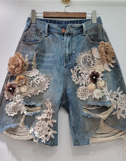 Load image into Gallery viewer, Women's Denim Shorts Elastic Waist Distressed Patchwork Lace Flowers 2026 Summer New Fashion

